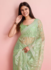Trendy looking saree in pista colour